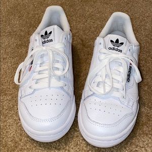 Size 7 woman’s adidas continental 80